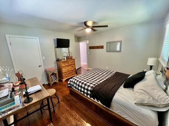 bedroom with a ceiling fan and wood finished floors