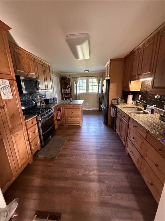 222 Akin Rd, Martin, GA 30557 - kitchen with black appliances, a sink, a peninsula, and dark wood-style flooring