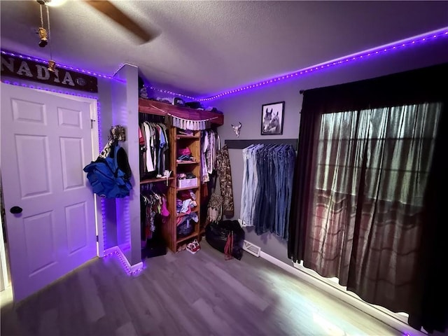 222 Akin Rd, Martin, GA 30557 - bedroom with wood finished floors, a textured ceiling, and a ceiling fan