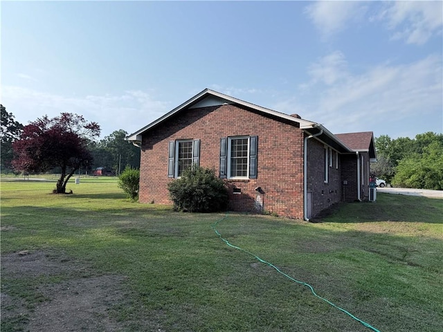 222 Akin Rd, Martin, GA 30557 - view of home's exterior featuring brick siding and a lawn