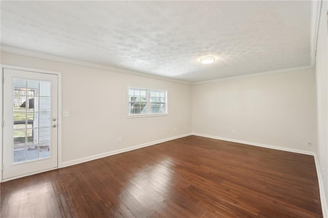 unfurnished room with dark wood-style floors, baseboards, a textured ceiling, and ornamental molding