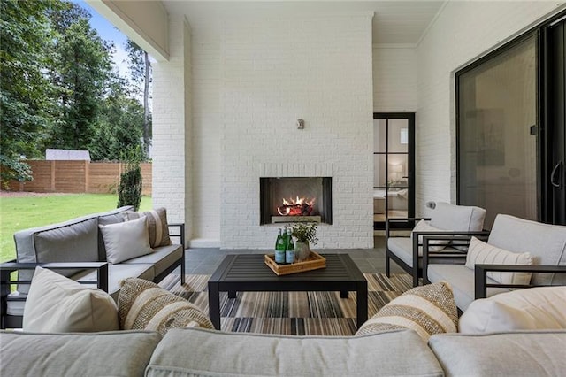 view of patio / terrace featuring an outdoor living space with a fireplace