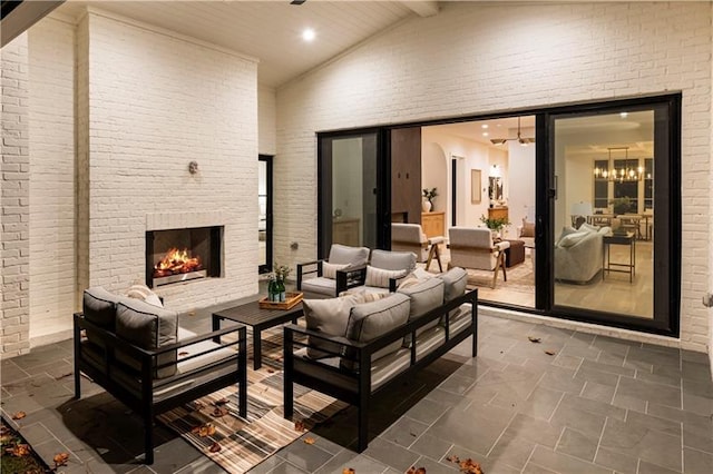 view of patio / terrace featuring an outdoor living space with a fireplace