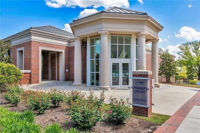 view of home's exterior featuring french doors