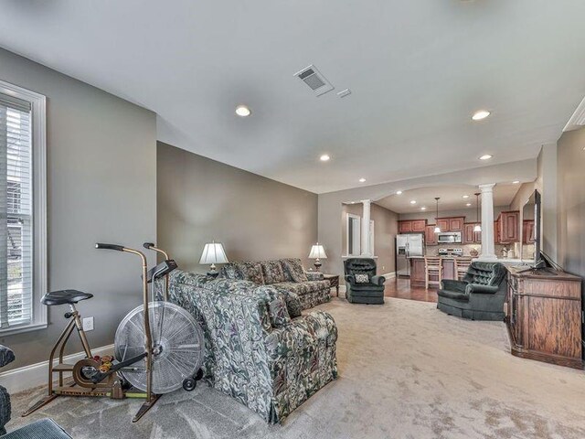 535 Crested Hawk Rdg, Canton, GA 30114 - carpeted living area with baseboards, recessed lighting, visible vents, and ornate columns