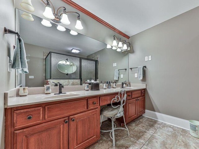 535 Crested Hawk Rdg, Canton, GA 30114 - bathroom featuring baseboards, a sink, double vanity, and a stall shower