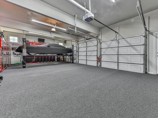 535 Crested Hawk Rdg, Canton, GA 30114 - garage with a garage door opener