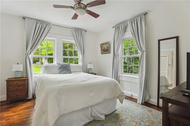 1096 Tilden St NW, Atlanta, GA 30318 - bedroom featuring multiple windows, wood finished floors, and baseboards