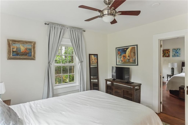 1096 Tilden St NW, Atlanta, GA 30318 - bedroom featuring wood finished floors and ceiling fan