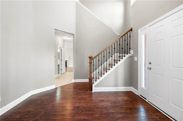 foyer with hardwood / wood-style flooring