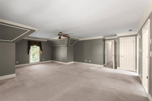 additional living space with light carpet, visible vents, baseboards, and a ceiling fan