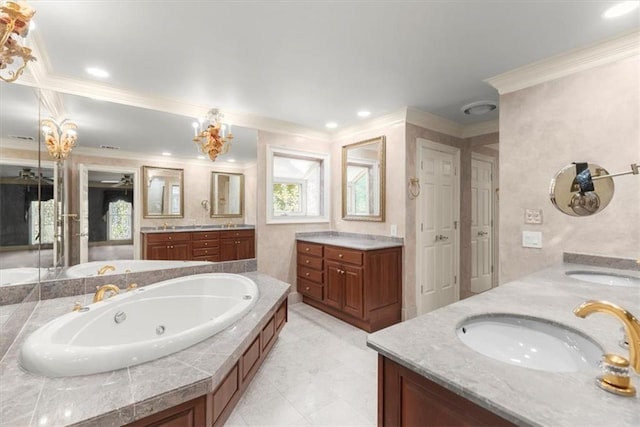 full bathroom featuring crown molding, two vanities, a sink, and a tub with jets