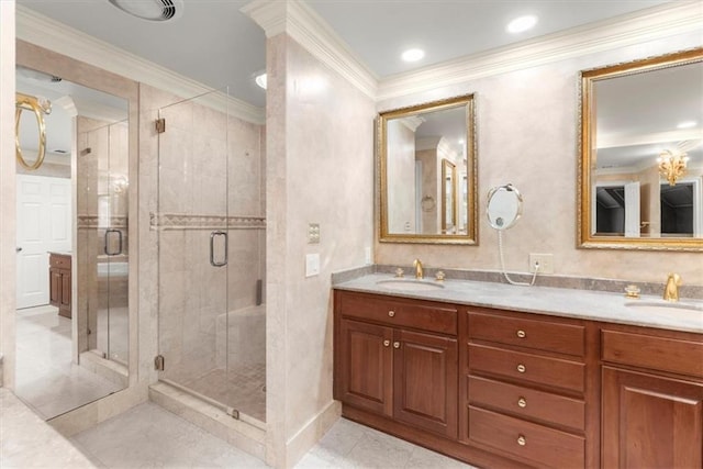 full bathroom featuring a stall shower, ornamental molding, a sink, and tile patterned floors