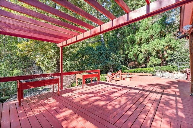 wooden deck with a pergola