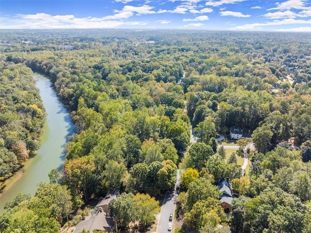 aerial view featuring a view of trees