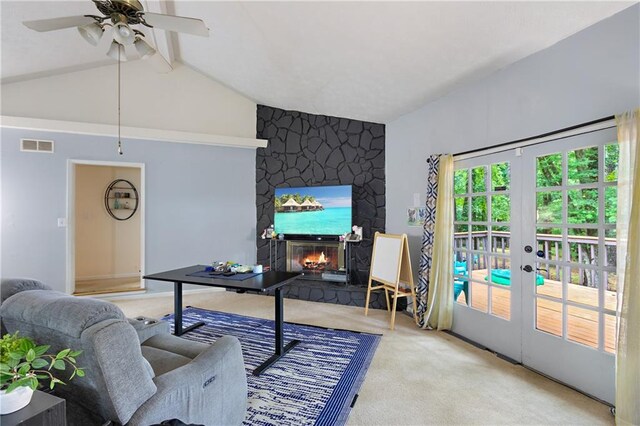 living room with french doors, a large fireplace, light colored carpet, ceiling fan, and lofted ceiling with beams