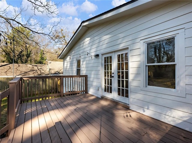 wooden terrace featuring french doors