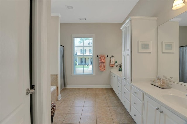 125 Rabbits Run, Fayetteville, GA 30215 - bathroom featuring double vanity, tile patterned flooring, and baseboards