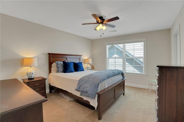 125 Rabbits Run, Fayetteville, GA 30215 - bedroom featuring light carpet, baseboards, ceiling fan, and a textured ceiling