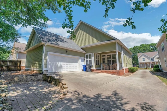 125 Rabbits Run, Fayetteville, GA 30215 - view of front of home with an attached garage, concrete driveway, and covered porch