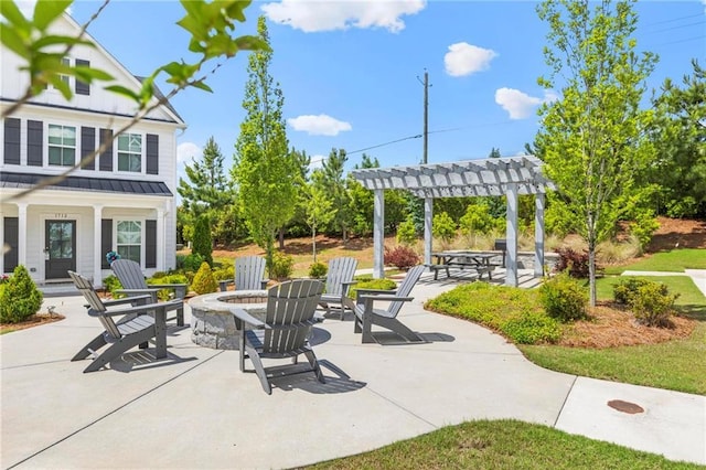 view of patio / terrace featuring a fire pit and a pergola