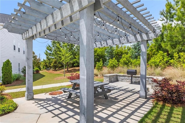 view of patio / terrace featuring a pergola