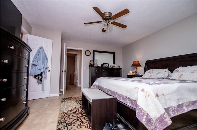 bedroom with light tile patterned floors and ceiling fan