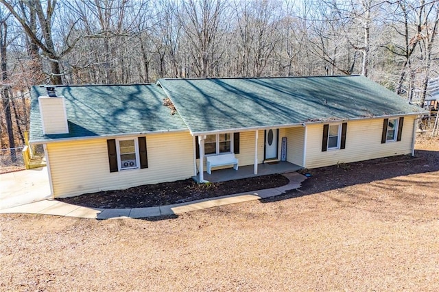 single story home with covered porch