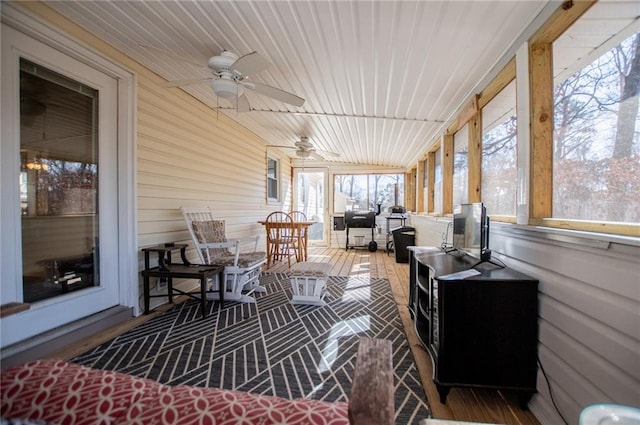 sunroom / solarium with wood ceiling