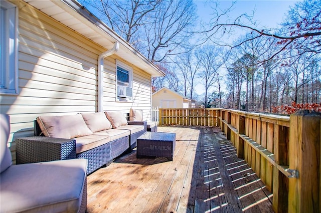 wooden deck featuring an outdoor hangout area