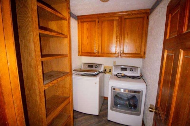 20 Lisa Ct, Stockbridge, GA 30281 - laundry area with washer and dryer, cabinet space, dark wood-type flooring, and wallpapered walls