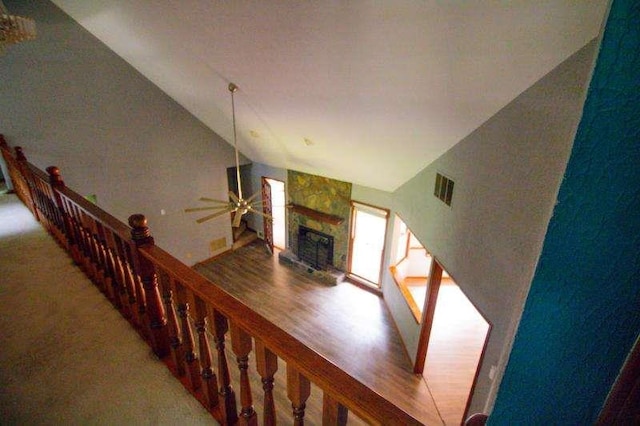 20 Lisa Ct, Stockbridge, GA 30281 - stairway featuring a ceiling fan, lofted ceiling, and a fireplace