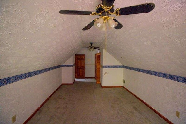 20 Lisa Ct, Stockbridge, GA 30281 - bonus room featuring a textured ceiling, a ceiling fan, baseboards, lofted ceiling, and carpet floors