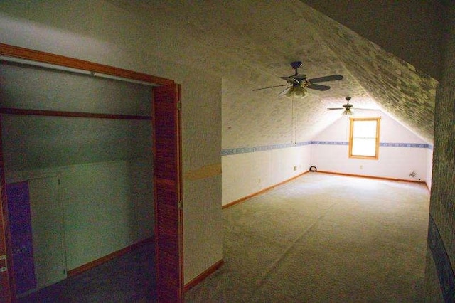 20 Lisa Ct, Stockbridge, GA 30281 - bonus room with vaulted ceiling, a ceiling fan, carpet floors, and baseboards