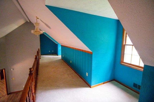 20 Lisa Ct, Stockbridge, GA 30281 - additional living space featuring lofted ceiling, baseboards, and carpet