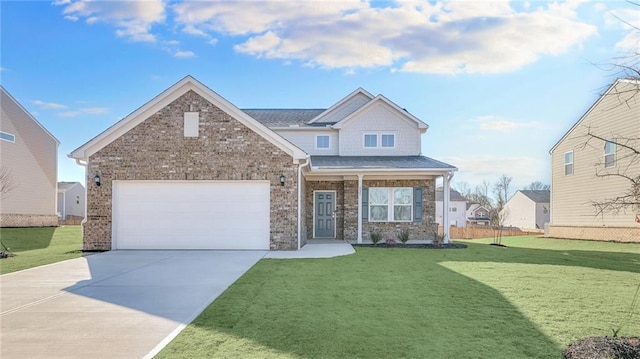 craftsman house with a front lawn and a garage