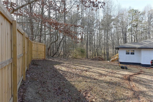 view of yard featuring fence