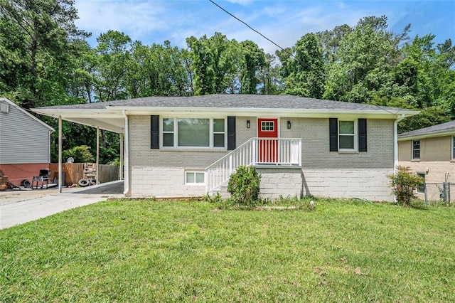 3204 Robin Rd, Decatur, GA 30032 - single story home with brick siding, concrete driveway, and a carport