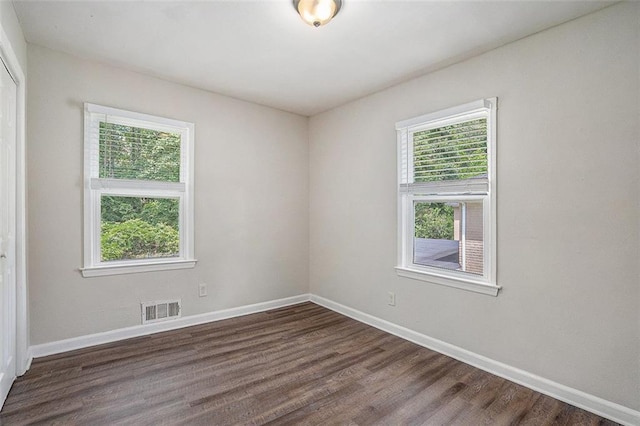 3204 Robin Rd, Decatur, GA 30032 - empty room featuring dark wood-style floors and baseboards