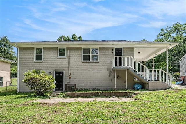 3204 Robin Rd, Decatur, GA 30032 - back of house with a yard and brick siding