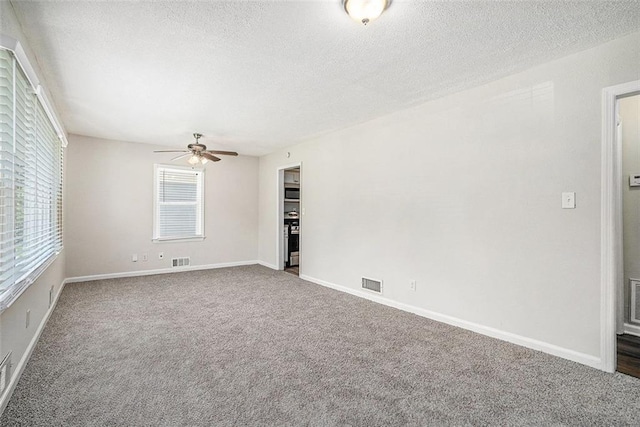 3204 Robin Rd, Decatur, GA 30032 - carpeted empty room with a textured ceiling, a ceiling fan, and baseboards