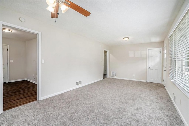 3204 Robin Rd, Decatur, GA 30032 - empty room with carpet, a ceiling fan, baseboards, and a smoke detector