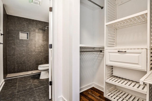 2195 Penelope St NW, Atlanta, GA 30314 - full bathroom with toilet, visible vents, tiled shower, and tile patterned flooring