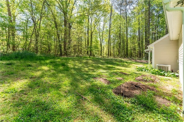 view of yard featuring central AC