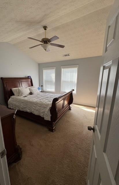 443 Marsh Lake Rd, Lawrenceville, GA 30045 - bedroom featuring carpet, a textured ceiling, lofted ceiling, and a ceiling fan