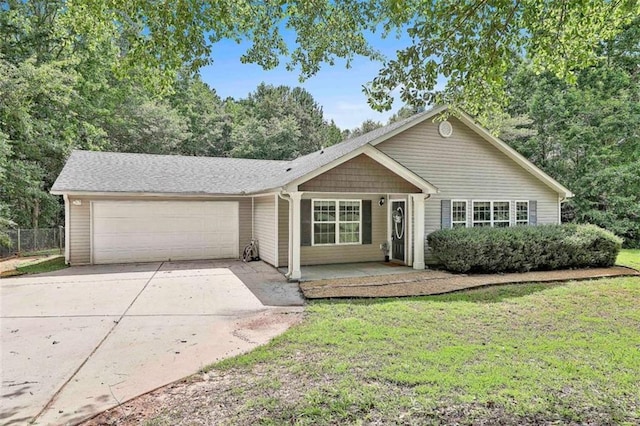 2551 Luther Bailey Rd, Senoia, GA 30276 - ranch-style house with an attached garage and concrete driveway