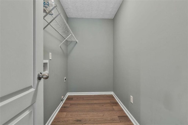 2551 Luther Bailey Rd, Senoia, GA 30276 - laundry area featuring electric dryer hookup, wood finished floors, washer hookup, and hookup for a gas dryer