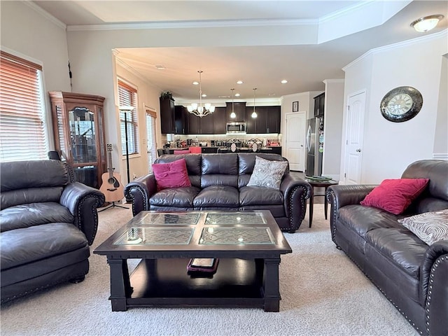 living room with light colored carpet, crown molding, recessed lighting, and a chandelier