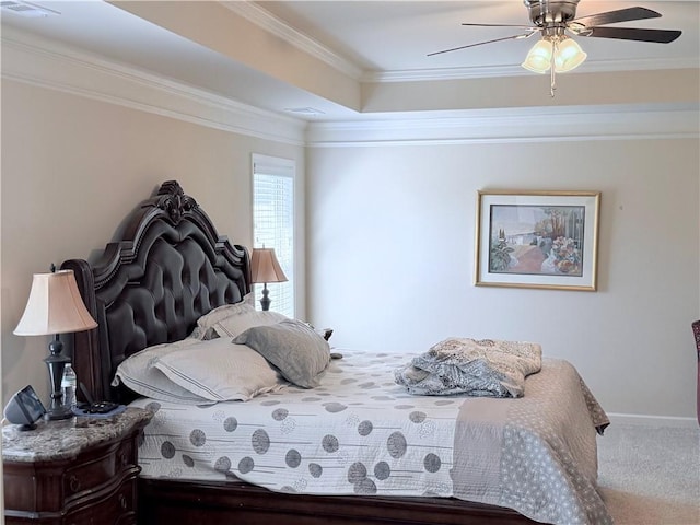 bedroom with baseboards, carpet flooring, ornamental molding, and ceiling fan