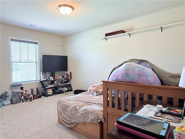 bedroom featuring carpet